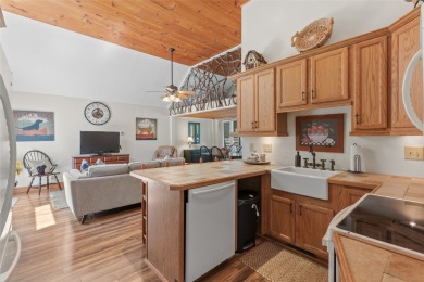 Two fully furnished studio units combined into one larger living on Red Bird Golf Links in North Carolina - for sale on GolfHomes.com, golf home, golf lot