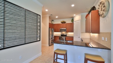 This beautifully maintained 2-bedroom, 2-bath, 2-car garage on Plantation Bay Golf and Country Club in Florida - for sale on GolfHomes.com, golf home, golf lot