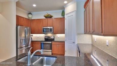 This beautifully maintained 2-bedroom, 2-bath, 2-car garage on Plantation Bay Golf and Country Club in Florida - for sale on GolfHomes.com, golf home, golf lot