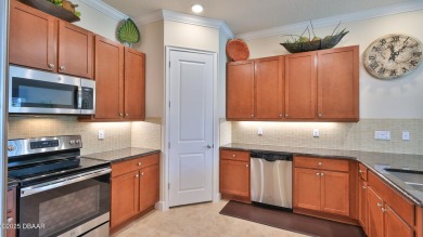 This beautifully maintained 2-bedroom, 2-bath, 2-car garage on Plantation Bay Golf and Country Club in Florida - for sale on GolfHomes.com, golf home, golf lot