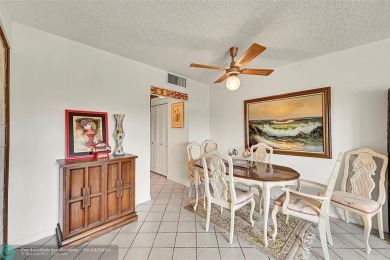 Priced under market! Well maintained 1 bed, 1.5 bath condo in on Wynmoor Golf Course in Florida - for sale on GolfHomes.com, golf home, golf lot