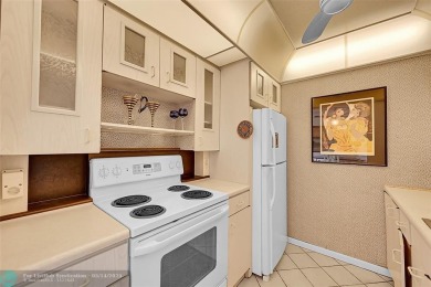 Priced under market! Well maintained 1 bed, 1.5 bath condo in on Wynmoor Golf Course in Florida - for sale on GolfHomes.com, golf home, golf lot