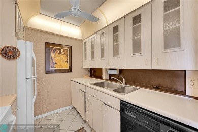 Priced under market! Well maintained 1 bed, 1.5 bath condo in on Wynmoor Golf Course in Florida - for sale on GolfHomes.com, golf home, golf lot