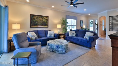 This beautifully maintained 2-bedroom, 2-bath, 2-car garage on Plantation Bay Golf and Country Club in Florida - for sale on GolfHomes.com, golf home, golf lot