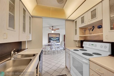 Priced under market! Well maintained 1 bed, 1.5 bath condo in on Wynmoor Golf Course in Florida - for sale on GolfHomes.com, golf home, golf lot