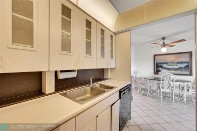 Priced under market! Well maintained 1 bed, 1.5 bath condo in on Wynmoor Golf Course in Florida - for sale on GolfHomes.com, golf home, golf lot