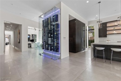 Perched on a quiet cul-de-sac in prestigious guard-gated on Dragon Ridge Country Club in Nevada - for sale on GolfHomes.com, golf home, golf lot