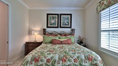 This beautifully maintained 2-bedroom, 2-bath, 2-car garage on Plantation Bay Golf and Country Club in Florida - for sale on GolfHomes.com, golf home, golf lot