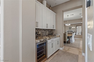 Embark on an extraordinary experience in this exquisite on Southern Highlands Golf Club in Nevada - for sale on GolfHomes.com, golf home, golf lot