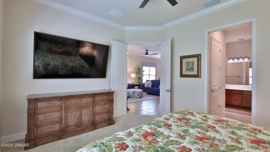 This beautifully maintained 2-bedroom, 2-bath, 2-car garage on Plantation Bay Golf and Country Club in Florida - for sale on GolfHomes.com, golf home, golf lot