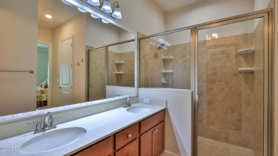This beautifully maintained 2-bedroom, 2-bath, 2-car garage on Plantation Bay Golf and Country Club in Florida - for sale on GolfHomes.com, golf home, golf lot