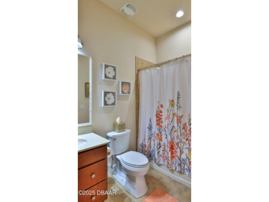 This beautifully maintained 2-bedroom, 2-bath, 2-car garage on Plantation Bay Golf and Country Club in Florida - for sale on GolfHomes.com, golf home, golf lot