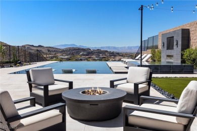 Perched on a quiet cul-de-sac in prestigious guard-gated on Dragon Ridge Country Club in Nevada - for sale on GolfHomes.com, golf home, golf lot