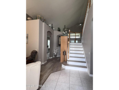 This amazing house features beautiful 21''cathedral ceilings in on Golf Club At Fleming Island in Florida - for sale on GolfHomes.com, golf home, golf lot