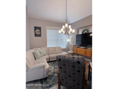 This amazing house features beautiful 21''cathedral ceilings in on Golf Club At Fleming Island in Florida - for sale on GolfHomes.com, golf home, golf lot