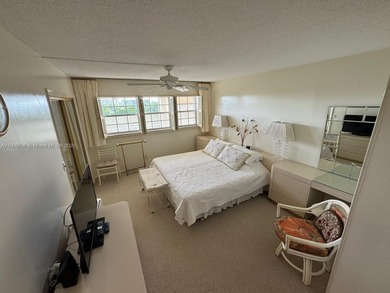 This 2/2 condo in the desirable Palm-Aire community on the 7th on Palm-Aire Country Club and Resort - Palms in Florida - for sale on GolfHomes.com, golf home, golf lot