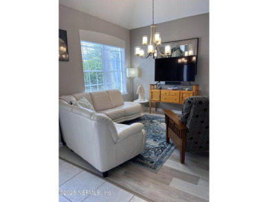 This amazing house features beautiful 21''cathedral ceilings in on Golf Club At Fleming Island in Florida - for sale on GolfHomes.com, golf home, golf lot