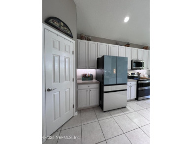 This amazing house features beautiful 21''cathedral ceilings in on Golf Club At Fleming Island in Florida - for sale on GolfHomes.com, golf home, golf lot
