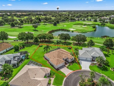 One or more photo(s) has been virtually staged. CUSTOM Magnolia on El Santiago Executive Golf Course in Florida - for sale on GolfHomes.com, golf home, golf lot