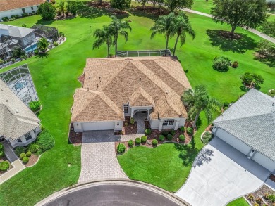 One or more photo(s) has been virtually staged. CUSTOM Magnolia on El Santiago Executive Golf Course in Florida - for sale on GolfHomes.com, golf home, golf lot
