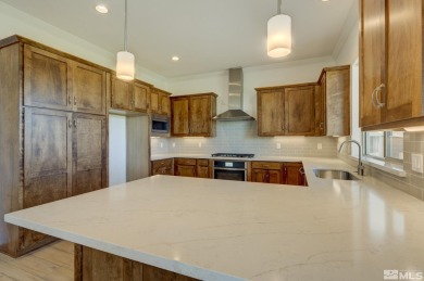 Gated community against the high desert hillside with on  in Nevada - for sale on GolfHomes.com, golf home, golf lot
