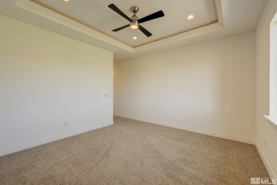Gated community against the high desert hillside with on  in Nevada - for sale on GolfHomes.com, golf home, golf lot