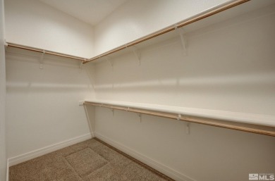 Gated community against the high desert hillside with on  in Nevada - for sale on GolfHomes.com, golf home, golf lot