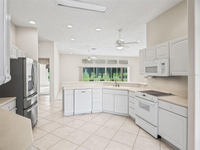 One or more photo(s) has been virtually staged. CUSTOM Magnolia on El Santiago Executive Golf Course in Florida - for sale on GolfHomes.com, golf home, golf lot