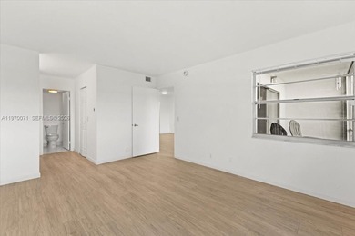 Beautiful first-floor unit featuring tile flooring throughout on Flamingo Lakes Country Club in Florida - for sale on GolfHomes.com, golf home, golf lot