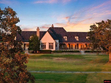 Welcome to your dream retreat! This exquisite Country French on Big Creek Golf and Country Club in Arkansas - for sale on GolfHomes.com, golf home, golf lot