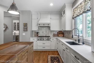 This custom property is tucked away on a quiet cul-de-sac is in on Oakhurst Golf and Country Club in Michigan - for sale on GolfHomes.com, golf home, golf lot