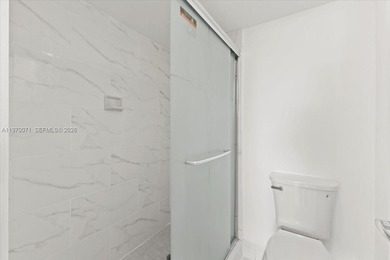 Beautiful first-floor unit featuring tile flooring throughout on Flamingo Lakes Country Club in Florida - for sale on GolfHomes.com, golf home, golf lot