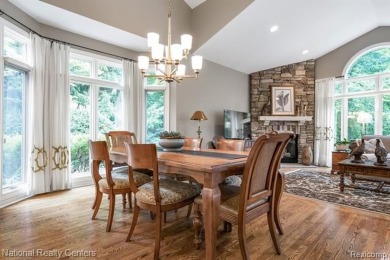 This custom property is tucked away on a quiet cul-de-sac is in on Oakhurst Golf and Country Club in Michigan - for sale on GolfHomes.com, golf home, golf lot