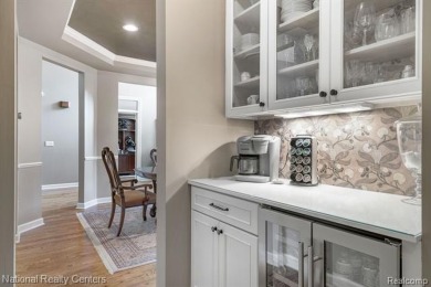 This custom property is tucked away on a quiet cul-de-sac is in on Oakhurst Golf and Country Club in Michigan - for sale on GolfHomes.com, golf home, golf lot