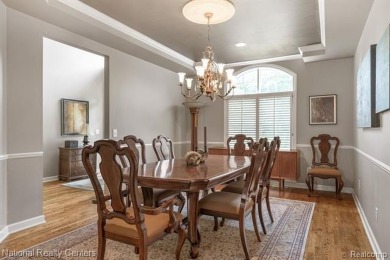 This custom property is tucked away on a quiet cul-de-sac is in on Oakhurst Golf and Country Club in Michigan - for sale on GolfHomes.com, golf home, golf lot