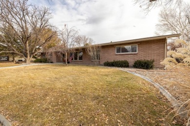 Welcome to this beautifully updated brick home nestled in the on Bookcliff Country Club in Colorado - for sale on GolfHomes.com, golf home, golf lot