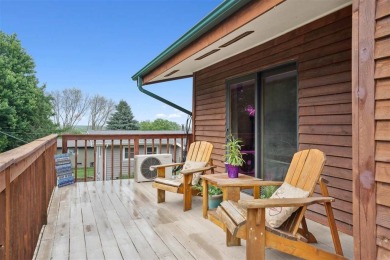 Cozy up to the crackle of the real wood fireplace in this home on Lake McBride Golf Course in Iowa - for sale on GolfHomes.com, golf home, golf lot