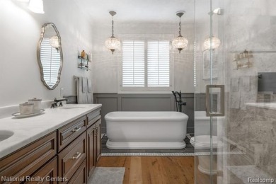 This custom property is tucked away on a quiet cul-de-sac is in on Oakhurst Golf and Country Club in Michigan - for sale on GolfHomes.com, golf home, golf lot