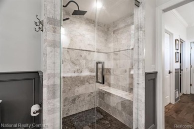 This custom property is tucked away on a quiet cul-de-sac is in on Oakhurst Golf and Country Club in Michigan - for sale on GolfHomes.com, golf home, golf lot