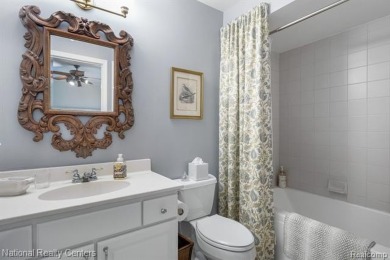This custom property is tucked away on a quiet cul-de-sac is in on Oakhurst Golf and Country Club in Michigan - for sale on GolfHomes.com, golf home, golf lot
