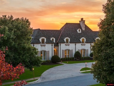 Welcome to your dream retreat! This exquisite Country French on Big Creek Golf and Country Club in Arkansas - for sale on GolfHomes.com, golf home, golf lot