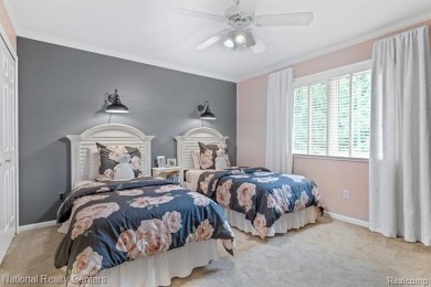 This custom property is tucked away on a quiet cul-de-sac is in on Oakhurst Golf and Country Club in Michigan - for sale on GolfHomes.com, golf home, golf lot