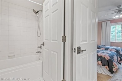 This custom property is tucked away on a quiet cul-de-sac is in on Oakhurst Golf and Country Club in Michigan - for sale on GolfHomes.com, golf home, golf lot