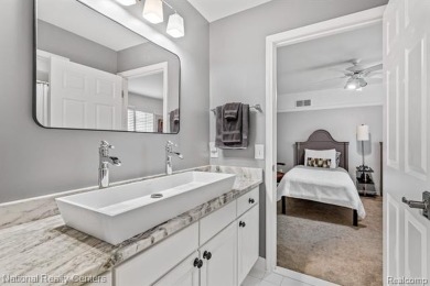 This custom property is tucked away on a quiet cul-de-sac is in on Oakhurst Golf and Country Club in Michigan - for sale on GolfHomes.com, golf home, golf lot
