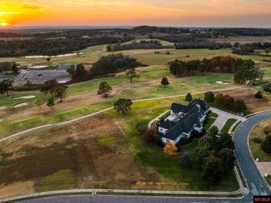 Welcome to your dream retreat! This exquisite Country French on Big Creek Golf and Country Club in Arkansas - for sale on GolfHomes.com, golf home, golf lot