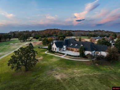 Welcome to your dream retreat! This exquisite Country French on Big Creek Golf and Country Club in Arkansas - for sale on GolfHomes.com, golf home, golf lot