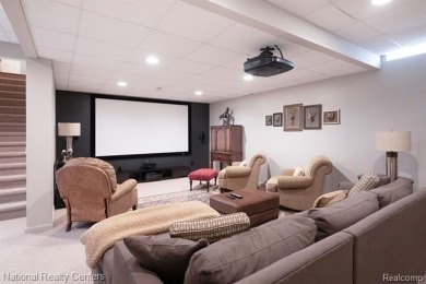 This custom property is tucked away on a quiet cul-de-sac is in on Oakhurst Golf and Country Club in Michigan - for sale on GolfHomes.com, golf home, golf lot