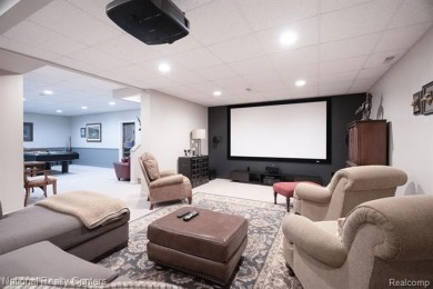 This custom property is tucked away on a quiet cul-de-sac is in on Oakhurst Golf and Country Club in Michigan - for sale on GolfHomes.com, golf home, golf lot