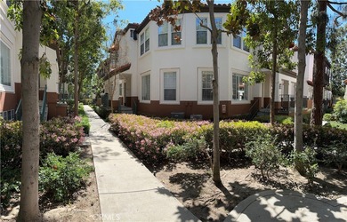 Charming Mediterranean style townhome located in Tustin Ranch on Tustin Ranch Golf Club in California - for sale on GolfHomes.com, golf home, golf lot