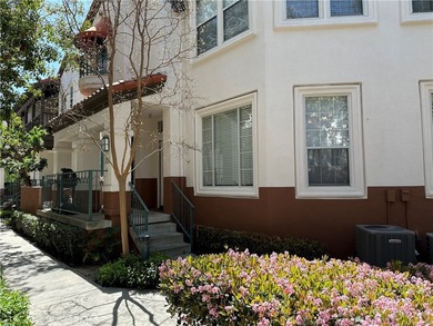 Charming Mediterranean style townhome located in Tustin Ranch on Tustin Ranch Golf Club in California - for sale on GolfHomes.com, golf home, golf lot